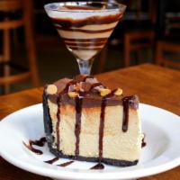 Peanut Butter Pie · House-made peanut butter mousse in a chocolate cookie crust, topped with a layer of chocolat...
