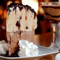 Mocha Mud Pie · Coffee and chocolate ice cream piled high on an Oreo cookie crust, topped with hot fudge, ho...