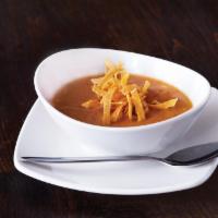 Sedona Tortilla Soup · Vine-ripened tomatoes, tomatillos and corn with mild green chilies, Southwestern spices and ...