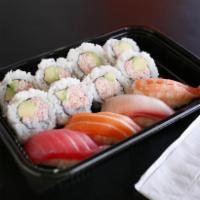 29. Spicy Tuna Roll and Nigiri · Spicy tuna roll 8 pieces and 4 pieces nigiri.