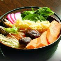Nabeyaki Udon · Soup udon with chicken, mixed seafood, tempura shrimp, veggies and egg.