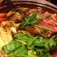 Beef Sukiyaki · Thin slice beef, tofu and vegetable cooked in sweet soy sauce.