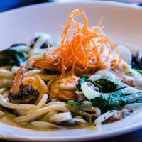 Seafood Yaki Udon · Stir-fried shrimp and udon with assorted seafood.