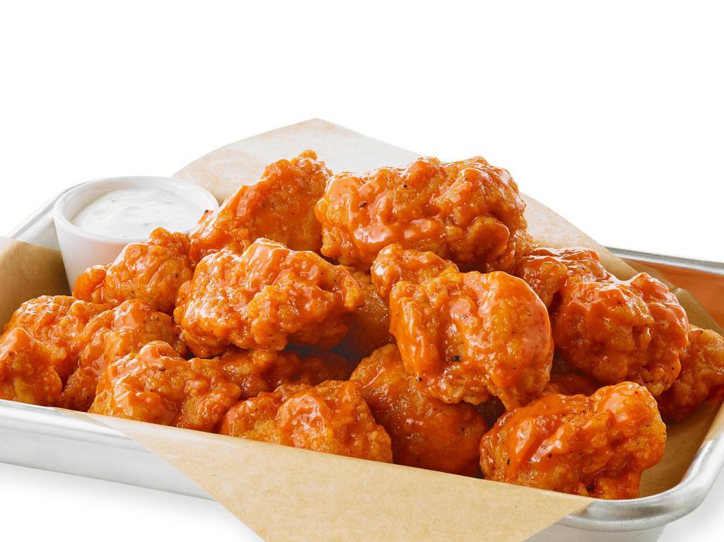 Boneless 20 Piece Wings · Fresh, award-winning and authentic Buffalo, New York-style wings. Hand-spun in choice of your favorite sauce or dry seasoning and served with choice of dipping sauce or veggie. 20 boneless wing.