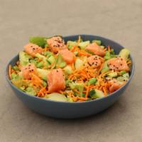 Asian Salmon · Mixed Greens, Baked Salmon, Edamame, Carrots, Cucumbers and Asian Dressing.