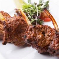 7. A Skewer of Lamb Kabob · A skewer of our imported New Zealand lamb specially marinated and charbroiled over an open f...