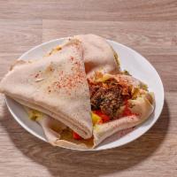 Vegetarian-vegan Combination · A serving of our Ethiopian vegetarian-vegan specialties: gomen, mesir wot, ater kik, teqel g...