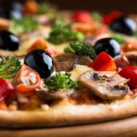 Veggie Delight Pizza · Mushrooms, bell peppers, tomato, onions, olives, artichoke hearts  and garlic. Vegetarian.