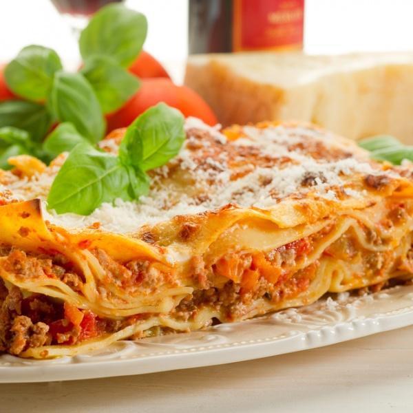 Meat Lasagna · Layers of pasta, ricotta cheese, and hearty meat sauce baked and covered with mozzarella cheese. Served with salad and garlic bread.