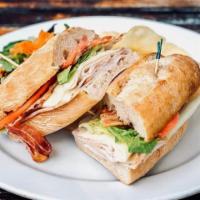 Turkey BLT Sandwich · Smoked turkey, bacon, lettuce, Swiss cheese, tomato and mayo. Served with chips. Served on r...