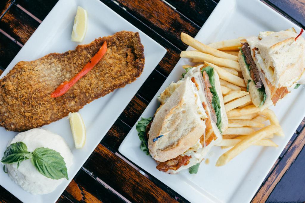Veal Milanesa · Breaded veal. Served with your choice of side.