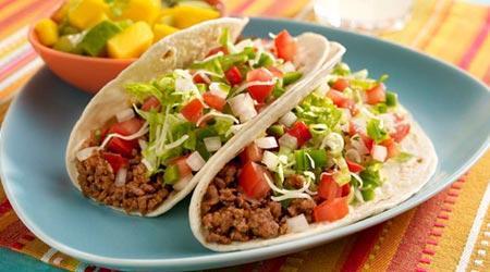 16. Stewed Chicken California Taco · Hard shell tortillas with cheese, lettuce, tomato and mild salsa.