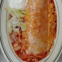Wet Combo Burrito  · Steak or chicken with beans and cheese covered in red or green sauce with sour cream.