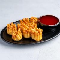 Crabmeat Cheese Wontons · 8 pieces. Stuffed Chinese dumpling.