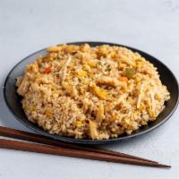 Chicken Fried Rice · Stir-fried rice with poultry.