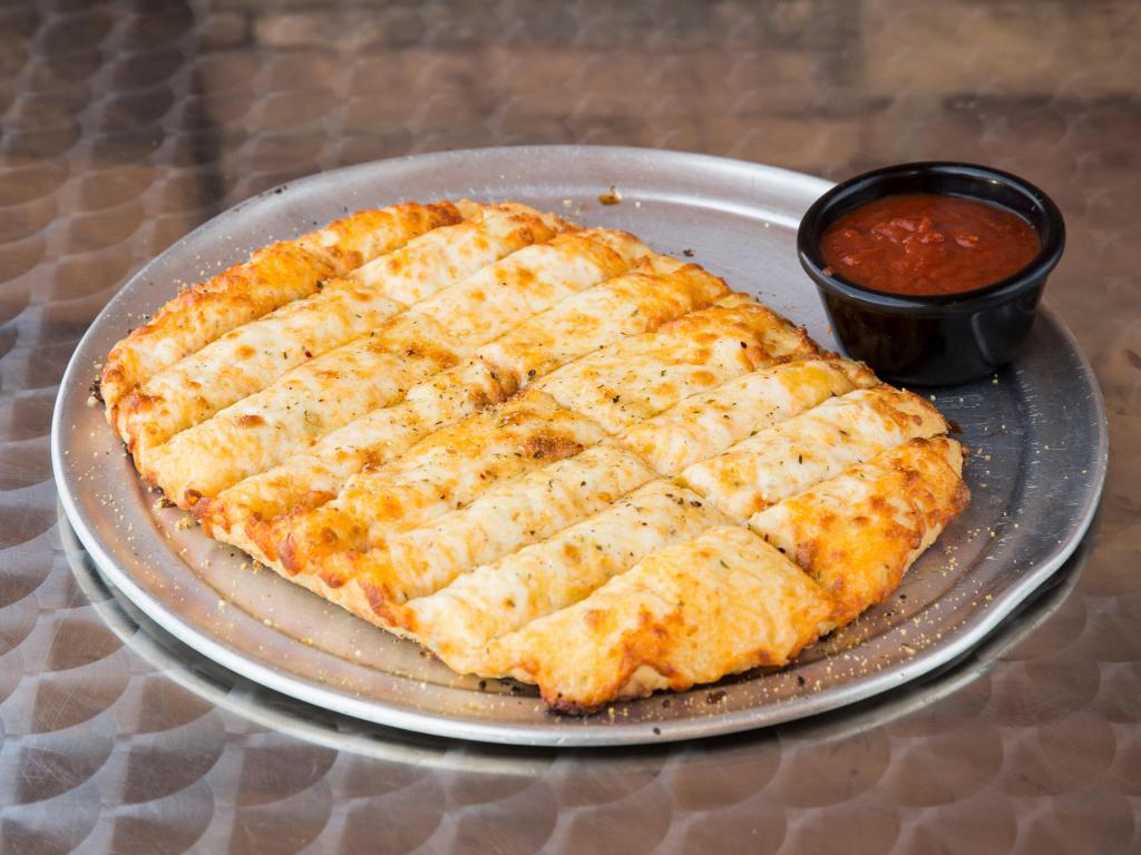 Cheesy Bread · Strip covered in cheese with Zzeek's shake.
