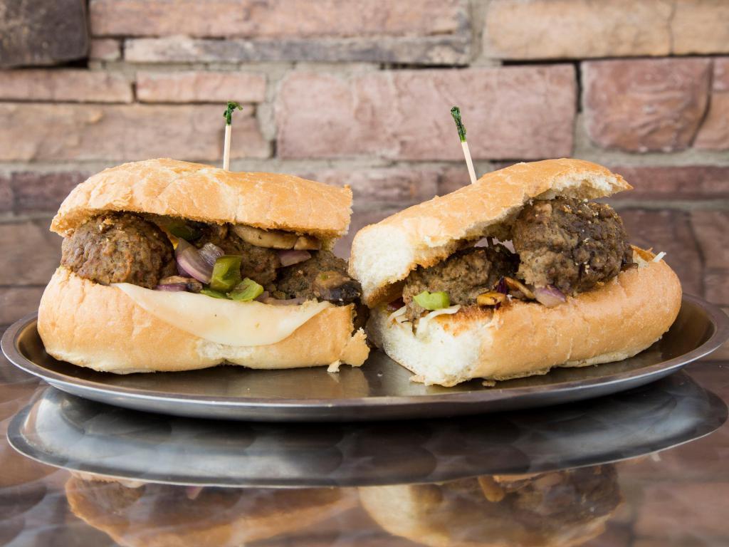 Meatball Sandwich · Meatballs, marinara sauce, mushrooms, green peppers. red onions. mozzarella and provolone cheese.