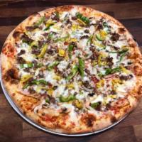 * Steak Bomb Pizza · Loaded with seasoned steak, green peppers, banana peppers, onions, mushrooms and mozzarella....