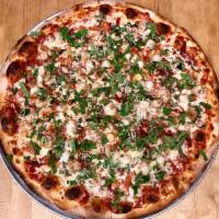 * Red Spicy Seafood Pizza · Scallops and shrimp sauteed in our red sauce, diced tomatoes, roasted garlic, bacon, fresh b...