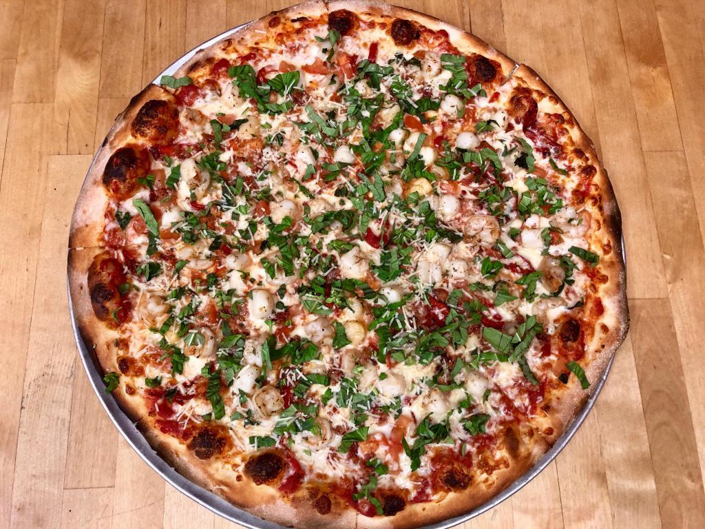 * Red Spicy Seafood Pizza · Scallops and shrimp sauteed in our red sauce, diced tomatoes, roasted garlic, bacon, fresh basil, mozzarella, shredded Parmesan and roasted peppers. Spicy.