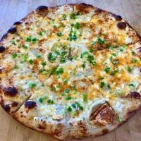* 5 Cheese White Pizza · Ricotta base, topped with Gorgonzola, cheddar, feta, smoked Gouda and mozzarella.