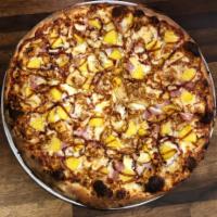 BBQ Chicken and Friends Pizza · Smoked Gouda, grilled pineapple and Canadian bacon basted in our homemade BBQ sauce with moz...