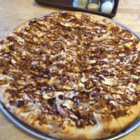 * Jackson Chicken BBQ Pizza · Pulled chicken, basted with our homemade BBQ sauce and a mix of caramelized sliced red onion...