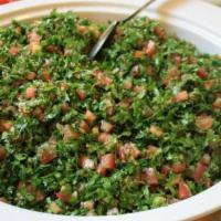 Taboule Salad · Chopped parsley, onion, tomato, Bulgar cracked-wheat lemon and olive oil. Vegan.