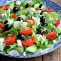 Greek Salad · Lettuce, tomato, cucumber, parsley, onion, feta-cheese and olives tossed in dried mint, oliv...