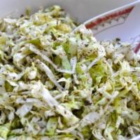 Cabbage Salad · Finely chopped cabbage tossed in dried mint, garlic, olive oil and lemon. Vegan.