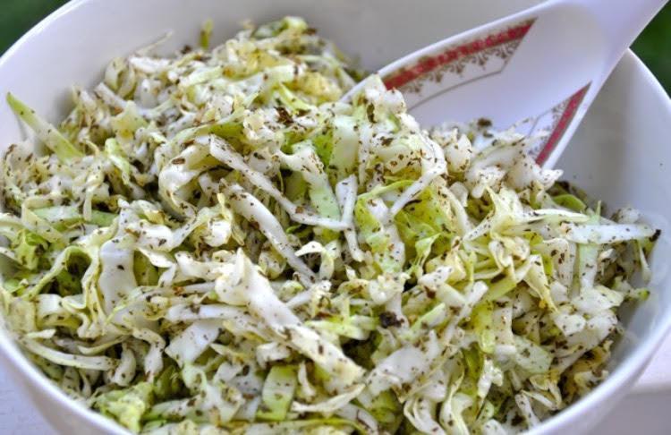 Cabbage Salad · Finely chopped cabbage tossed in dried mint, garlic, olive oil and lemon. Vegan.
