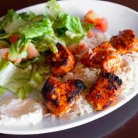 Chicken Kabab · Chunks of chicken breast marinated in garlic, grilled and served with Lebanese salad, rice a...