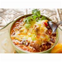 James World Famous Turkey Chili · Served with cheddar cheese and onions on the side. Add sour cream optional.