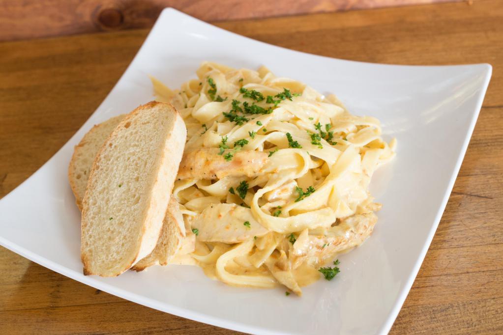 Chicken Alfredo · Sauteed chicken with garlic, herbs and mushrooms tossed in a cream sauce.