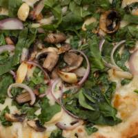 Spicy Veggie Pizza · White pie. Shiitake mushrooms, spinach, roasted garlic, red onions, and chili flakes. Spicy.