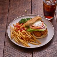 Chicken Sandwich Combo · Served on a sesame seed bun with lettuce, tomato, onions, and mayo. Served with 8 oz. of our...