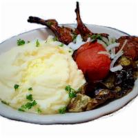 Lamb Chops plate · 3 peace marinated with many flavors lamb chops, served with pita, BBQ tomato, and Anaheim pe...