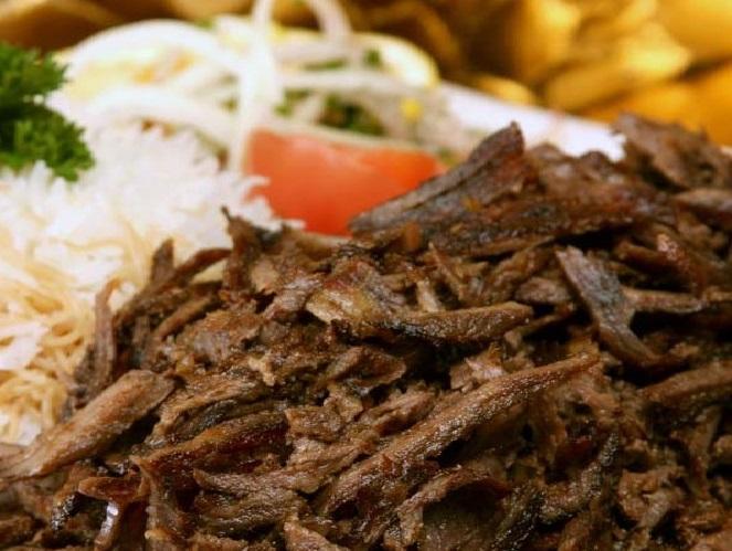 Shawarma Plate · Beef Shawarma with fresh chopped lettuce, tomatoes, onions, and parsley. With a side of hummus, pita, and dressing. Choice of rice, french fries or mashed potatoes available also.