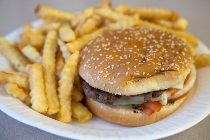 Cheeseburger Plate · Served with fries and a can of soda.