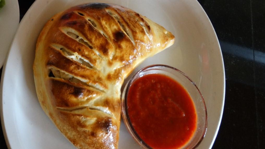 Meatball Calzone · Meatballs, ricotta and mozzarella cheese, fresh basil and tomato sauce.