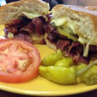 Pastrami Sandwich · Lean slices of pastrami, Mayonnaise, mustard, pickles and provolone cheeses on ciabatta bread