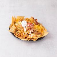 Nachos · Served with pinto beans, finely shredded cheeses, guacamole, pico de Gallo and sour cream, s...