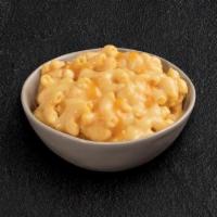 Cheddar Mac & Cheese · Classic macaroni in creamy cheese sauce and topped with melted sharp cheddar. Serves 4-6.