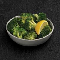 Lemon-butter Broccoli · Fresh steamed broccoli with Parmesan butter and lemon.