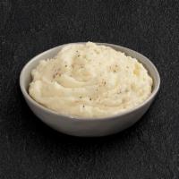 Mashed Potatoes · Creamy mashed potatoes blended with cheddar cheese, sour cream, and real butter. Serves 4-6.