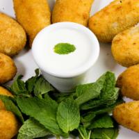 Jalapeno Poppers · 10 pieces. Roasted jalapeno poppers with cream cheese filling.