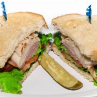 Club Sandwich · Turkey, ham, bacon, lettuce and tomatoes.