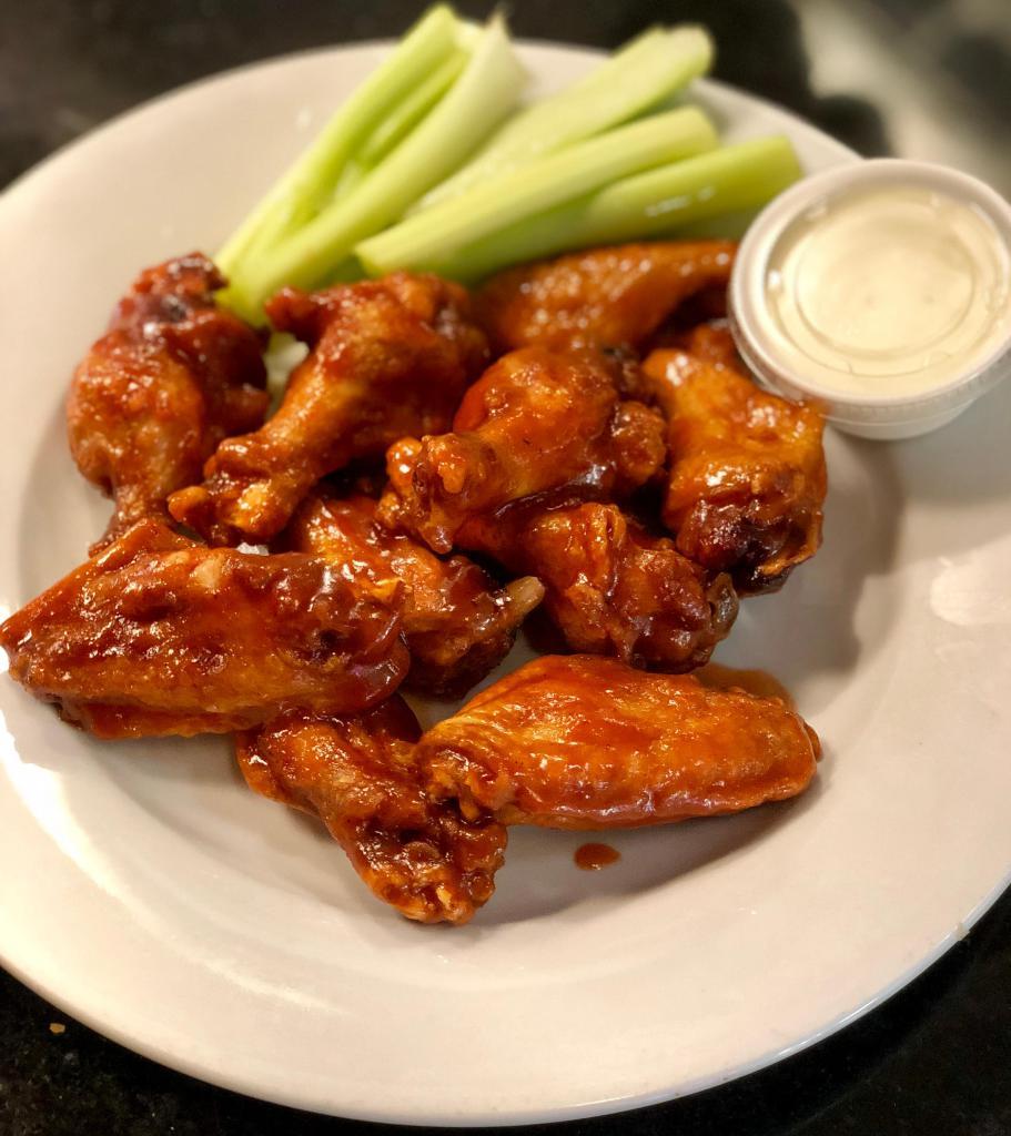 CHICKEN WINGS · Served with Celery, Blue cheese & toasted Bread. For every 10 wings there will be 1 cup of blue cheese.