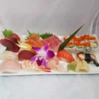 Gourmet Sushi and Sashimi Plate · 8 pieces of house selected sushi, 6 pieces California roll and 9 pieces sashimi.