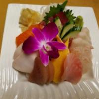 Chirashi Sushi Plate · An assortment of sashimi over sushi rice.